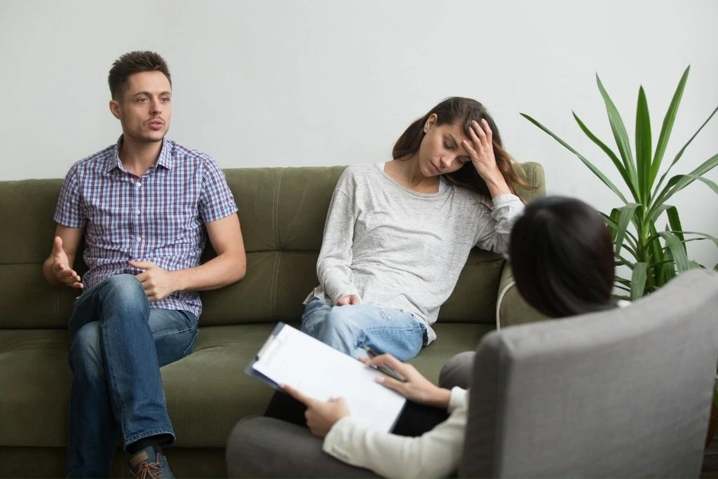 A couple in marriage counseling for infidelity.